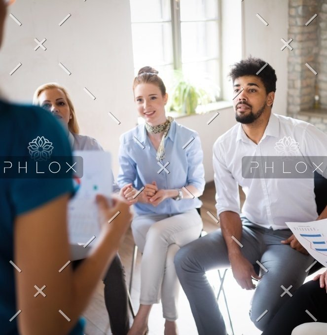 demo-attachment-473-happy-creative-team-in-office-business-startup-ASYDGB7